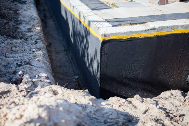 Professional Waterproofing technician working in Millbrook, NY